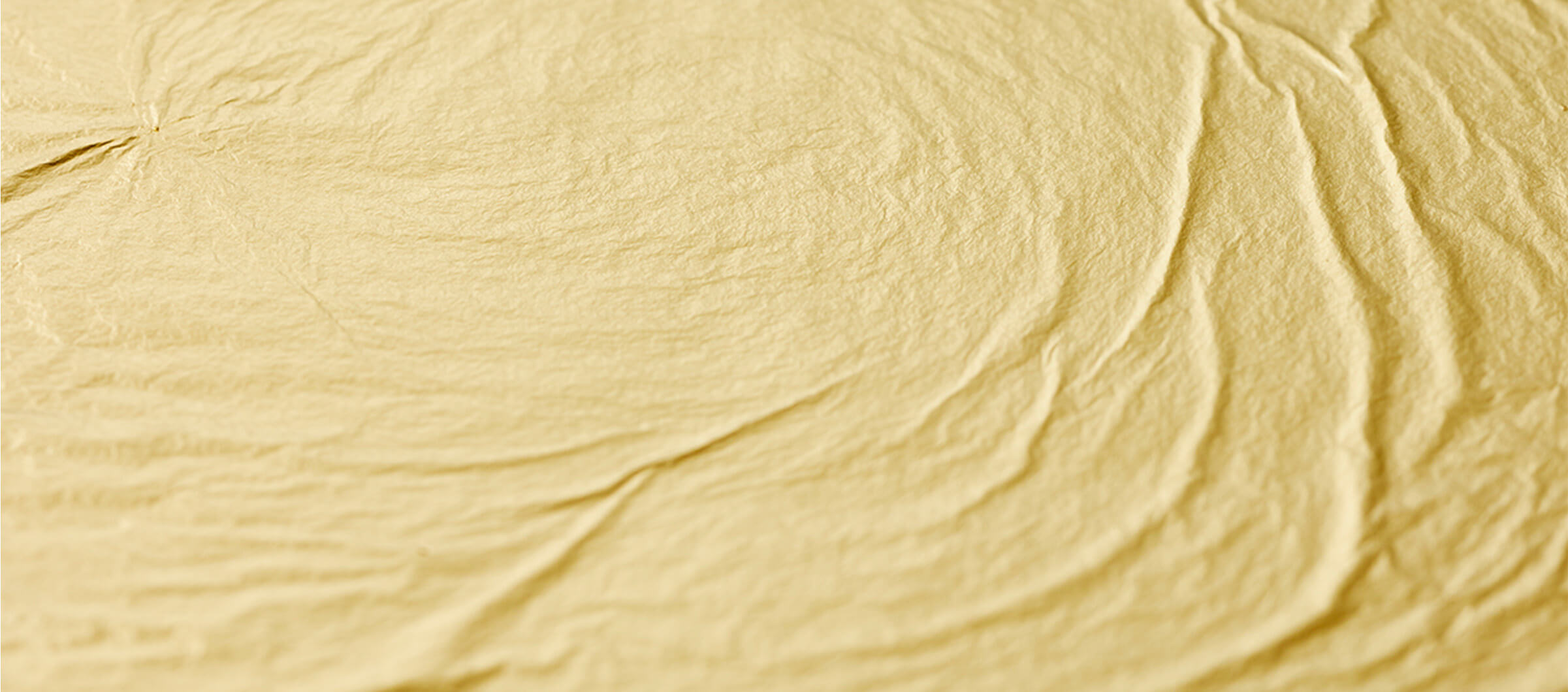 一万分の１ミリにまで均一に伸ばし広げられた純金の延板